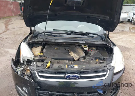 2015 Ford Escape Titanium z USA, uszkodzony, nr VIN 1FMCU0J99FUB12324